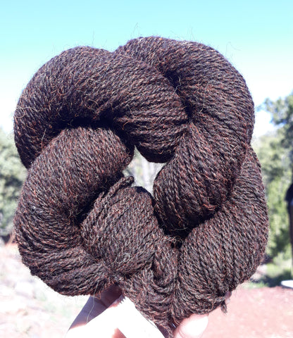 2 ply Sport. 100% black wool dyed orange